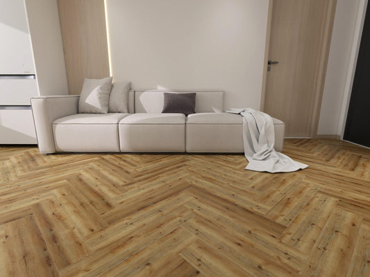Glue down herringbone LVT flooring in light oak finish, shown in a modern living room with Honeywood Classic luxury vinyl tiles