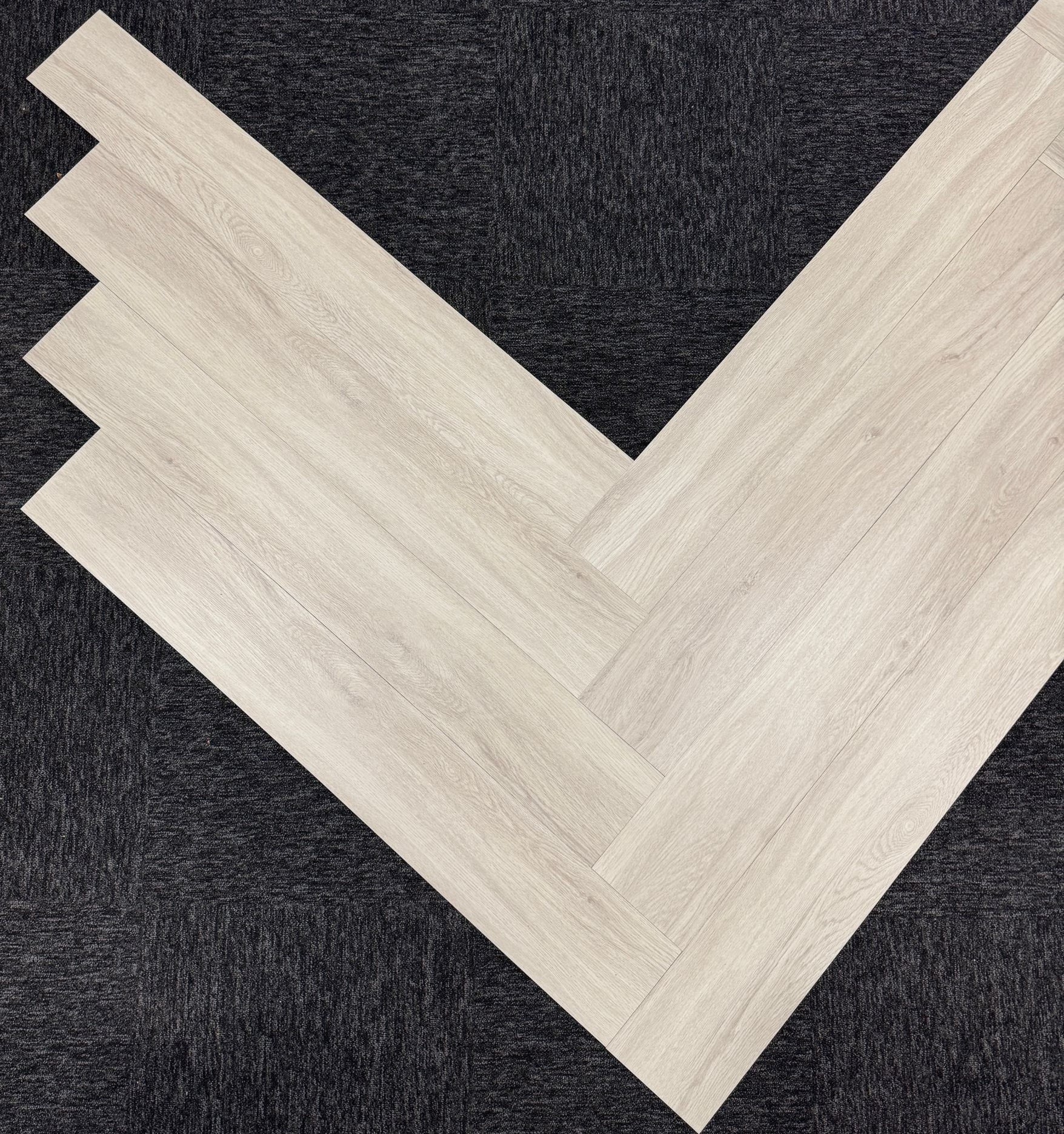 Full room view of Scandinavian pine flooring in modern kitchen