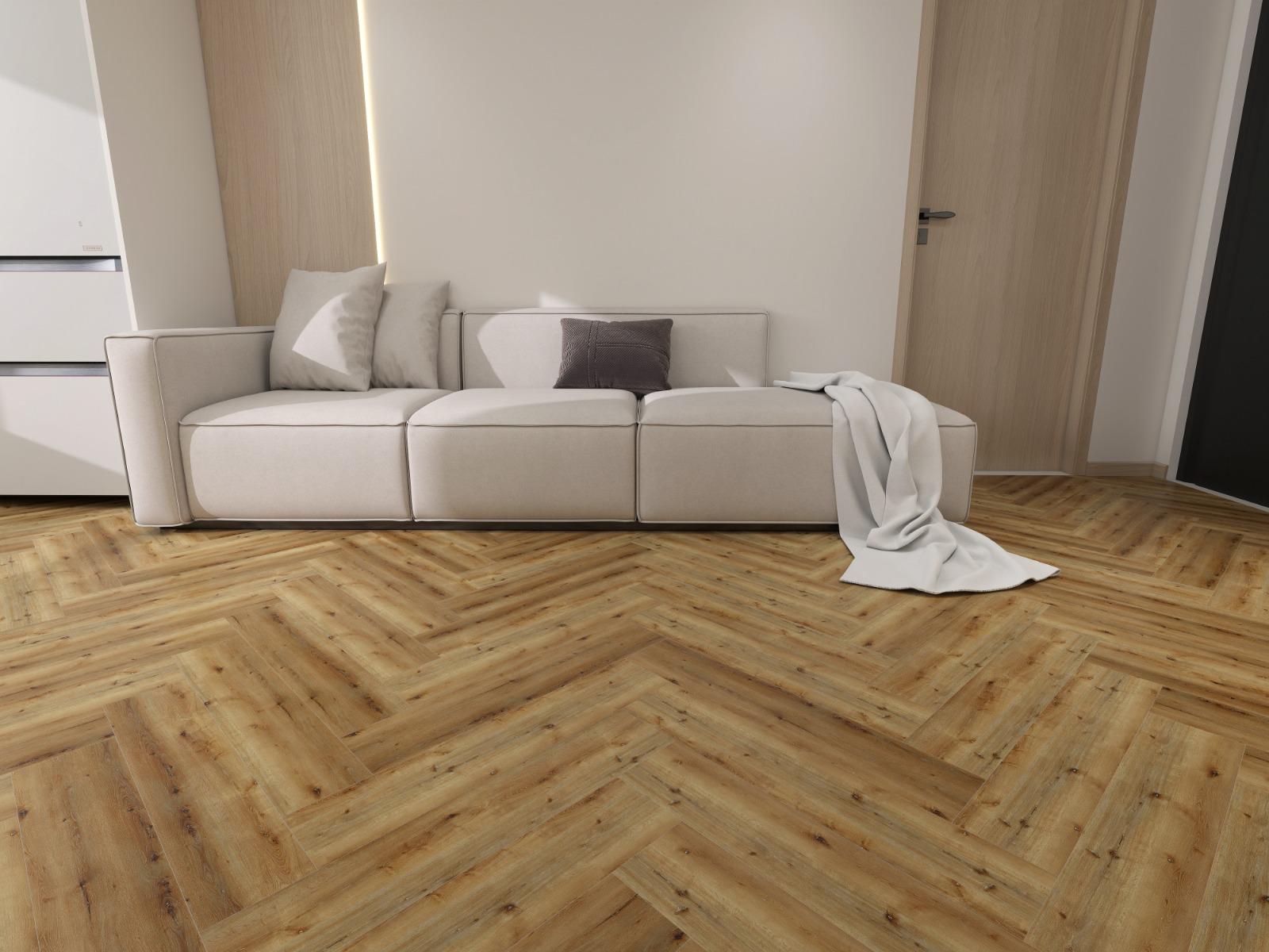Glue down herringbone LVT flooring in light oak finish, shown in a modern living room with Honeywood Classic luxury vinyl tiles