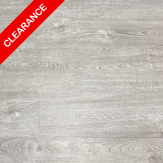 Gray wood-patterned lvt flooring with a red clearance label on the top left corner.