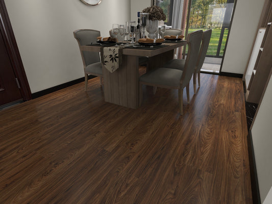 Dark brown wood-look laminate or vinyl flooring shown installed in a modern dining room with a gray dining table and chairs.
